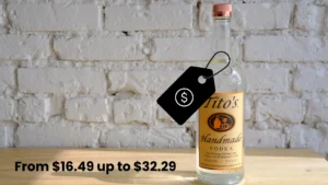 How much does Tito's vodka cost? What is Tito's vodka price? This image shows a botle of Tito's vodka with a price range described and a price tag.